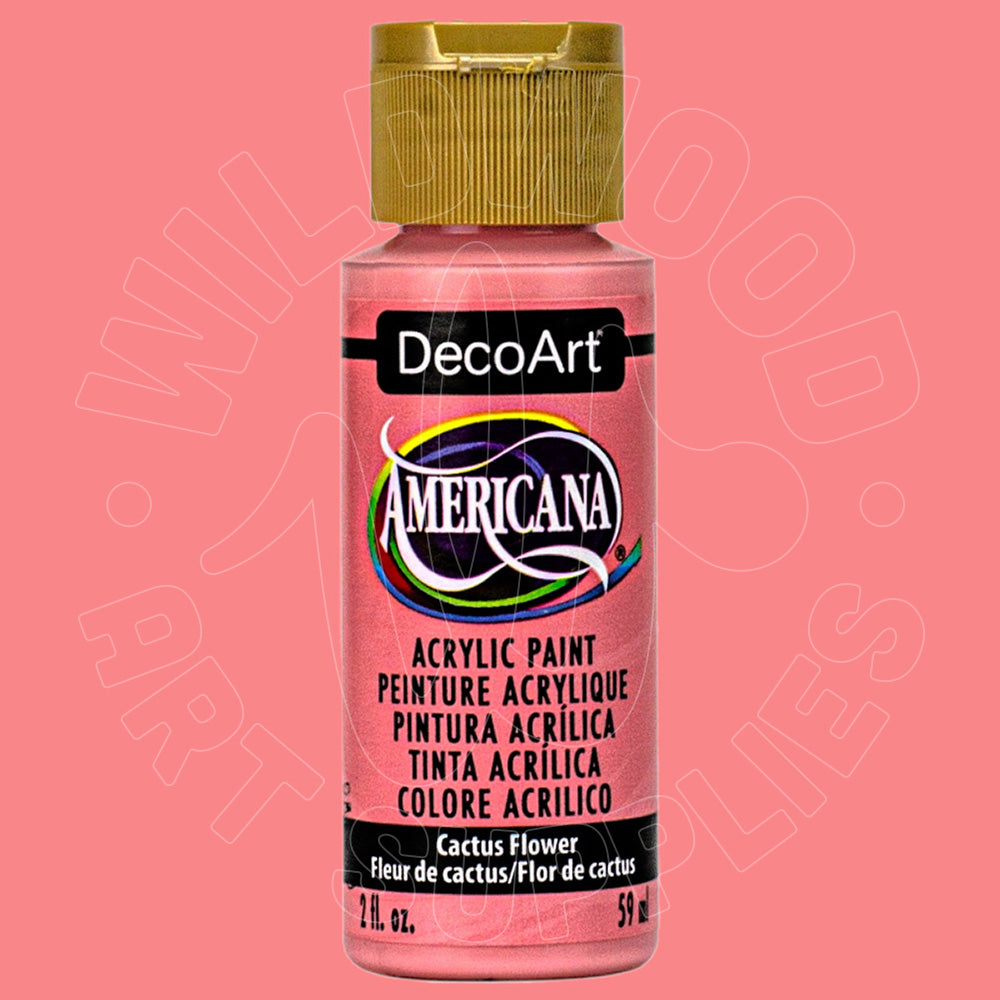 A bottle of DecoArt Americana acrylic paint in the shade 'Cactus Flower' against a solid pink background. The bottle has a gold cap and a pink label with black text.