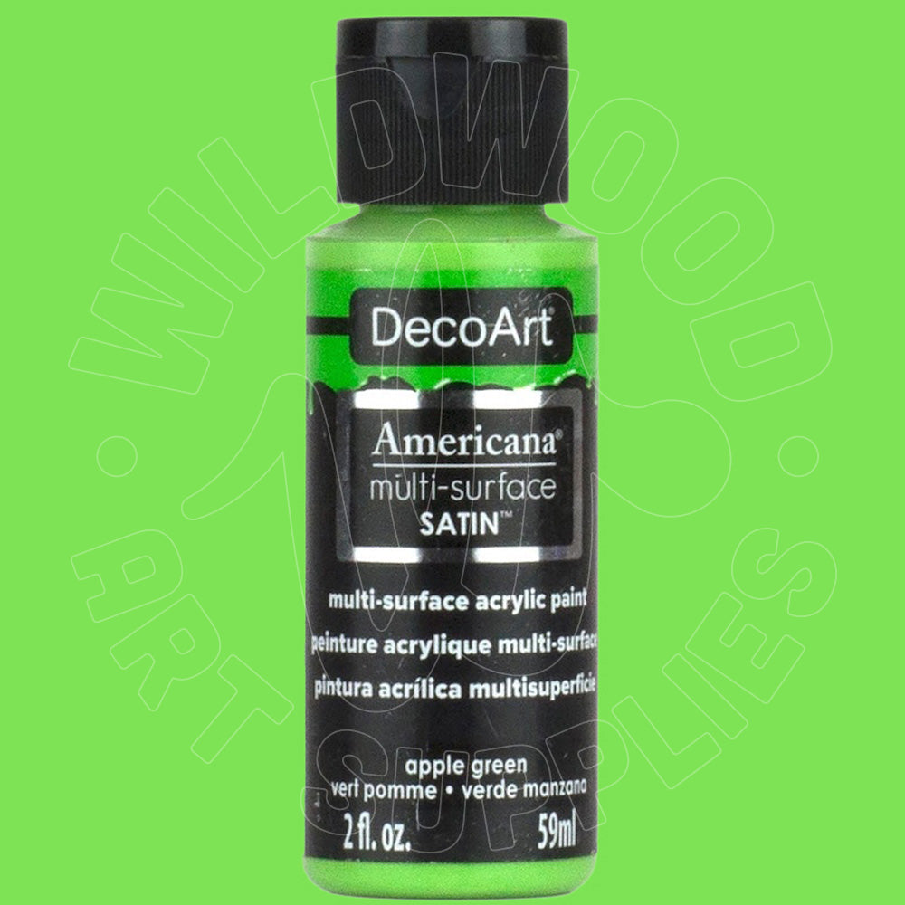 A bottle of DecoArt Americana multi-surface satin acrylic paint in apple green, shown against a solid light green background.