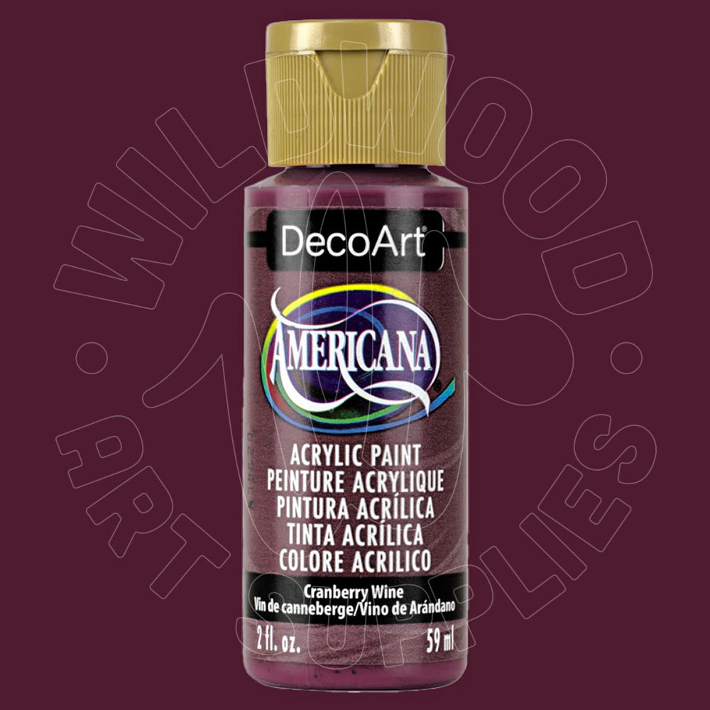 A bottle of DecoArt Americana acrylic paint in the color 'Cranberry Wine', featuring a gold cap and a black label with white text, set against a dark burgundy background with a faint watermark.