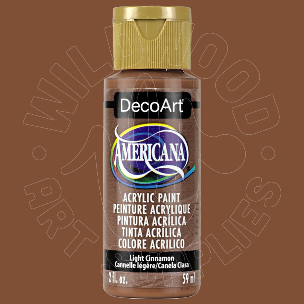 A bottle of DecoArt Americana acrylic paint in the color Light Cinnamon, featuring a brown body, a gold cap, and a black label with the DecoArt logo.