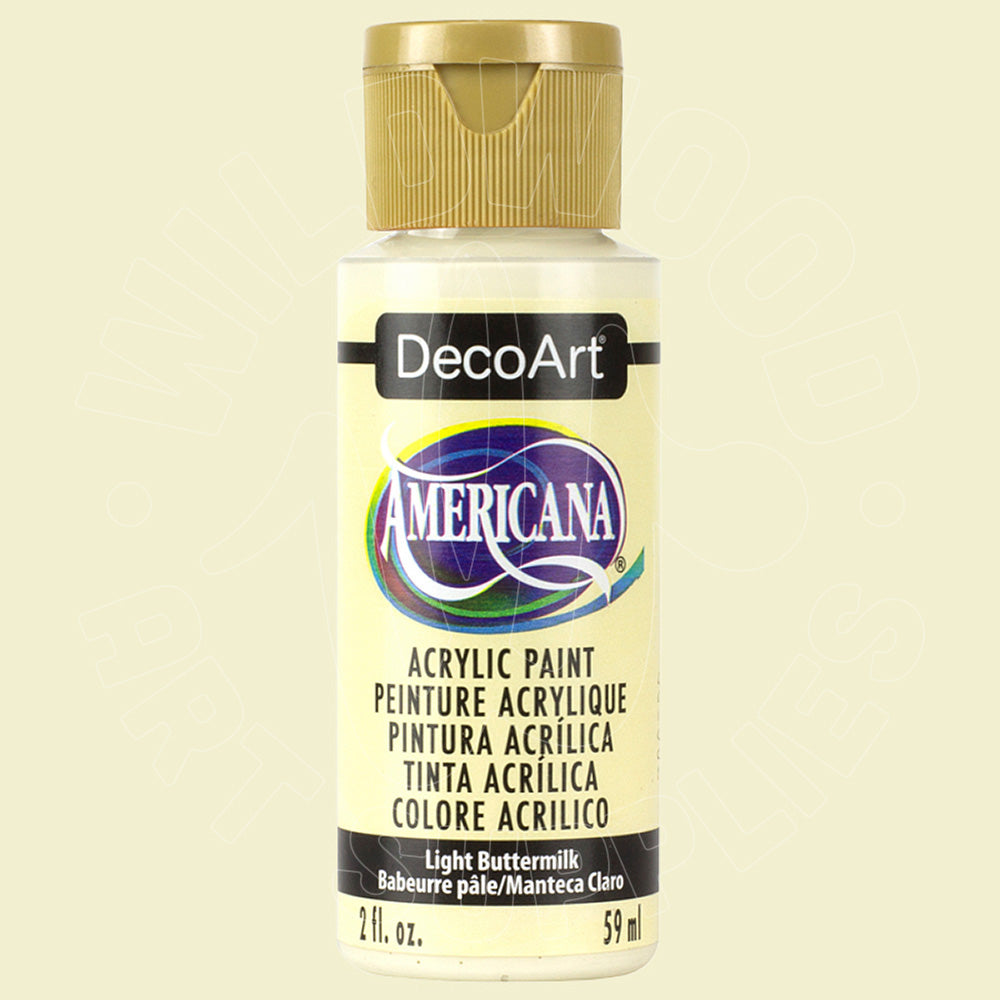 A bottle of DecoArt Americana acrylic paint in the color Light Buttermilk, featuring a gold cap and a cream-colored label with black text.