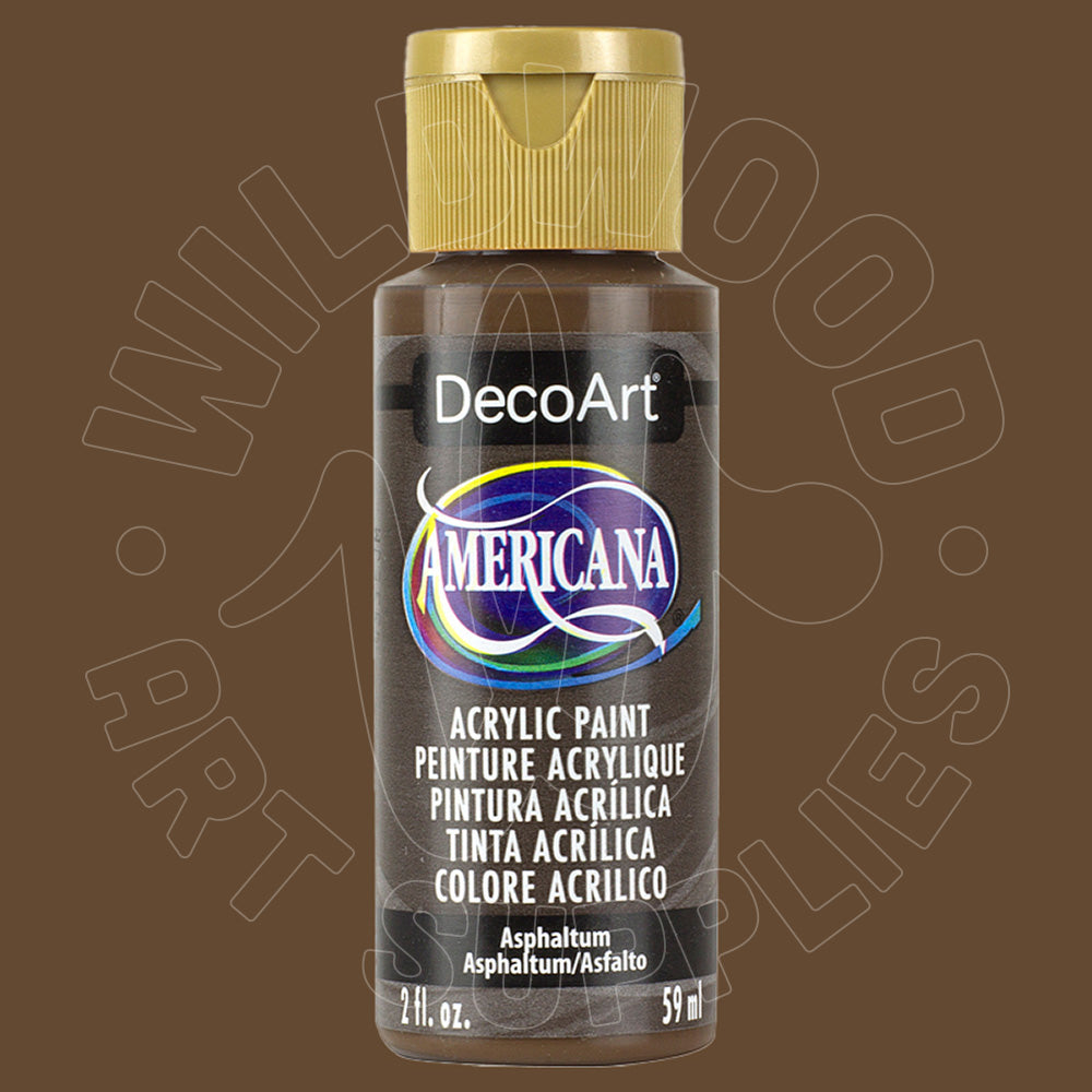 A bottle of DecoArt Americana acrylic paint in the color Asphalt, featuring a gold cap and a black label with a blue and white logo, set against a solid brown background.