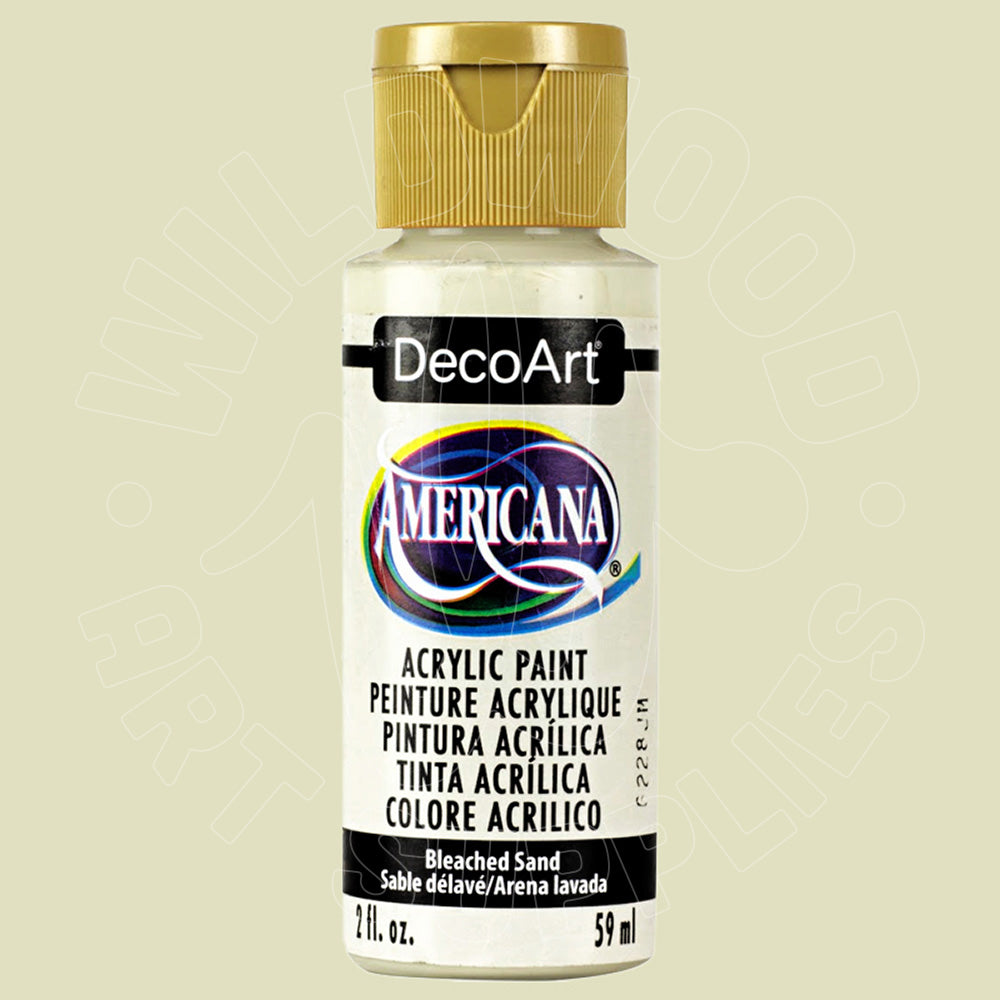 A bottle of DecoArt Americana acrylic paint in the color Bleached Sand, featuring a white label with a gold cap, set against a light beige background.