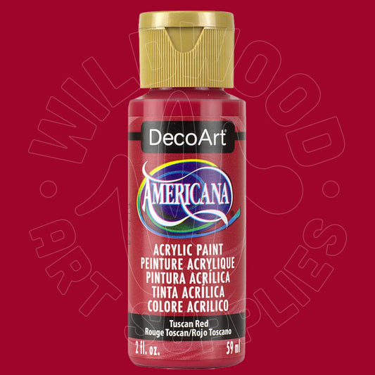 A bottle of DecoArt Americana Acrylic Paint in Tuscan Red, featuring a gold cap and a black label with the brand logo, set against a solid red background with a faint watermark.