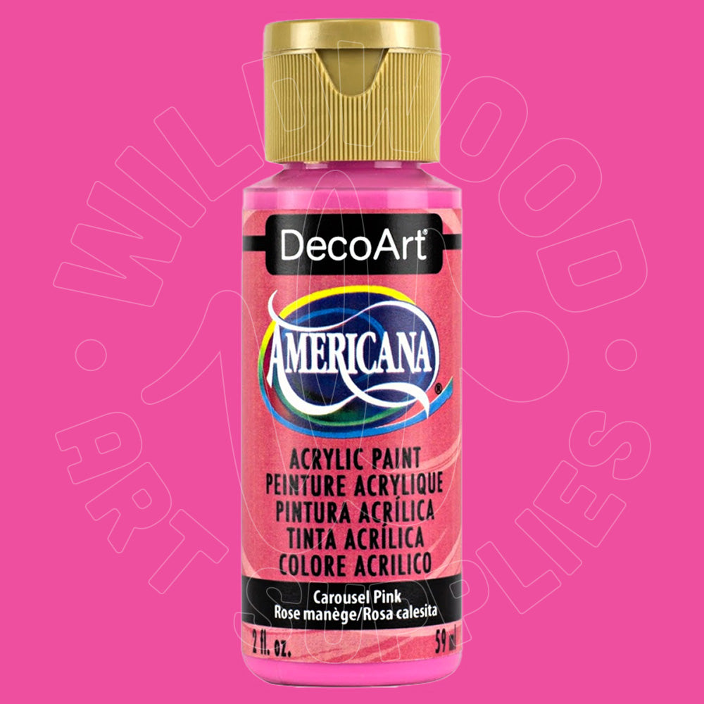 A bottle of DecoArt Americana acrylic paint in the shade Carousel Pink, featuring a gold cap and a pink label, set against a solid pink background with a faint watermark.