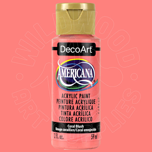 A bottle of DecoArt Americana acrylic paint in the shade Coral Blush, featuring a pink body, gold cap, and a black label with white and blue branding.