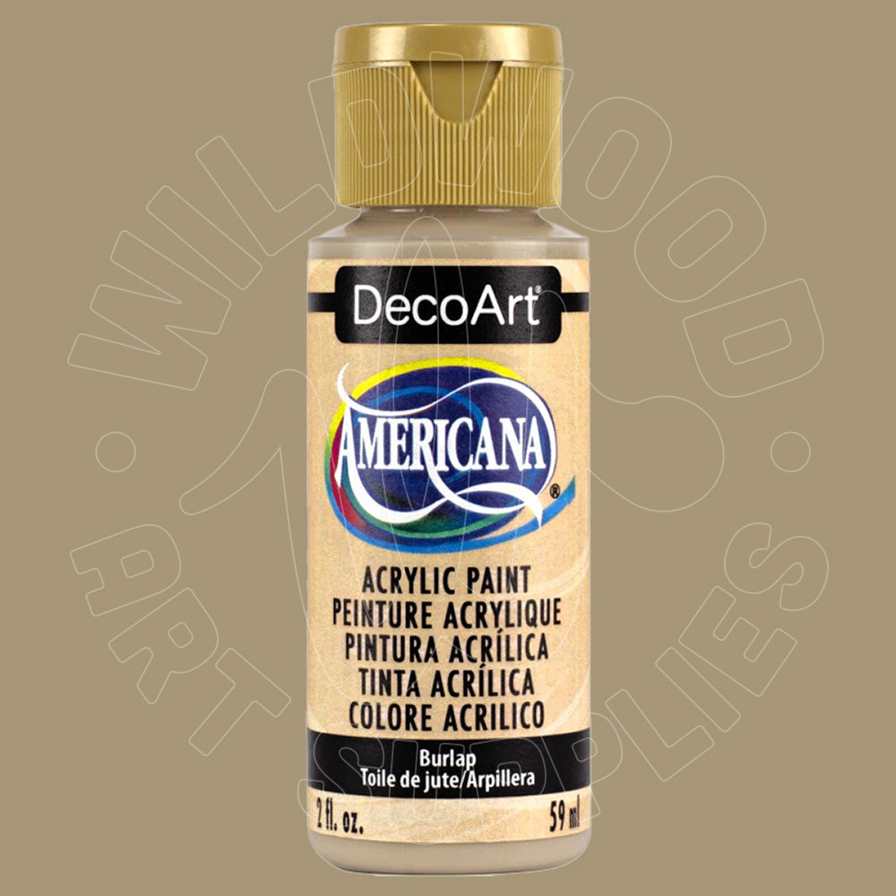 A bottle of DecoArt Americana acrylic paint in the color 'Burlap', featuring a gold cap and a beige label with the brand logo, set against a solid taupe background.