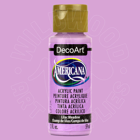 A bottle of DecoArt Americana acrylic paint in the shade Lilac Meadow, featuring a light purple body with a metallic gold cap, set against a solid lavender background.