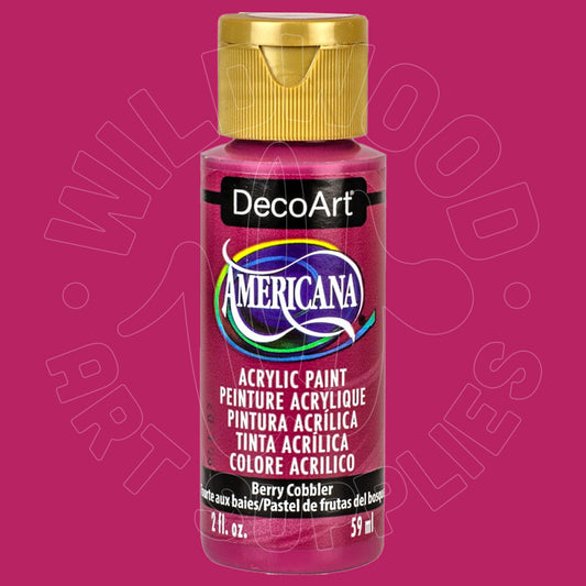 A bottle of DecoArt Americana acrylic paint in the color Berry Cobbler, featuring a metallic berry-pink label and a gold cap, set against a solid magenta background.
