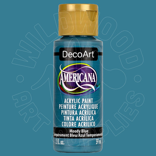 A bottle of DecoArt Americana acrylic paint in the color 'Moody Blue', featuring a metallic blue label and a gold cap, set against a solid teal-blue background with a faint watermark.