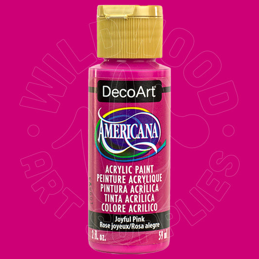 A bottle of DecoArt Americana Joyful Pink acrylic paint with a gold cap, centered against a bright pink background with a faint watermark.