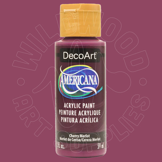 A bottle of DecoArt Americana acrylic paint in the color Cherry Merlot, featuring a gold cap and a dark label with the brand logo, set against a solid plum-colored background.