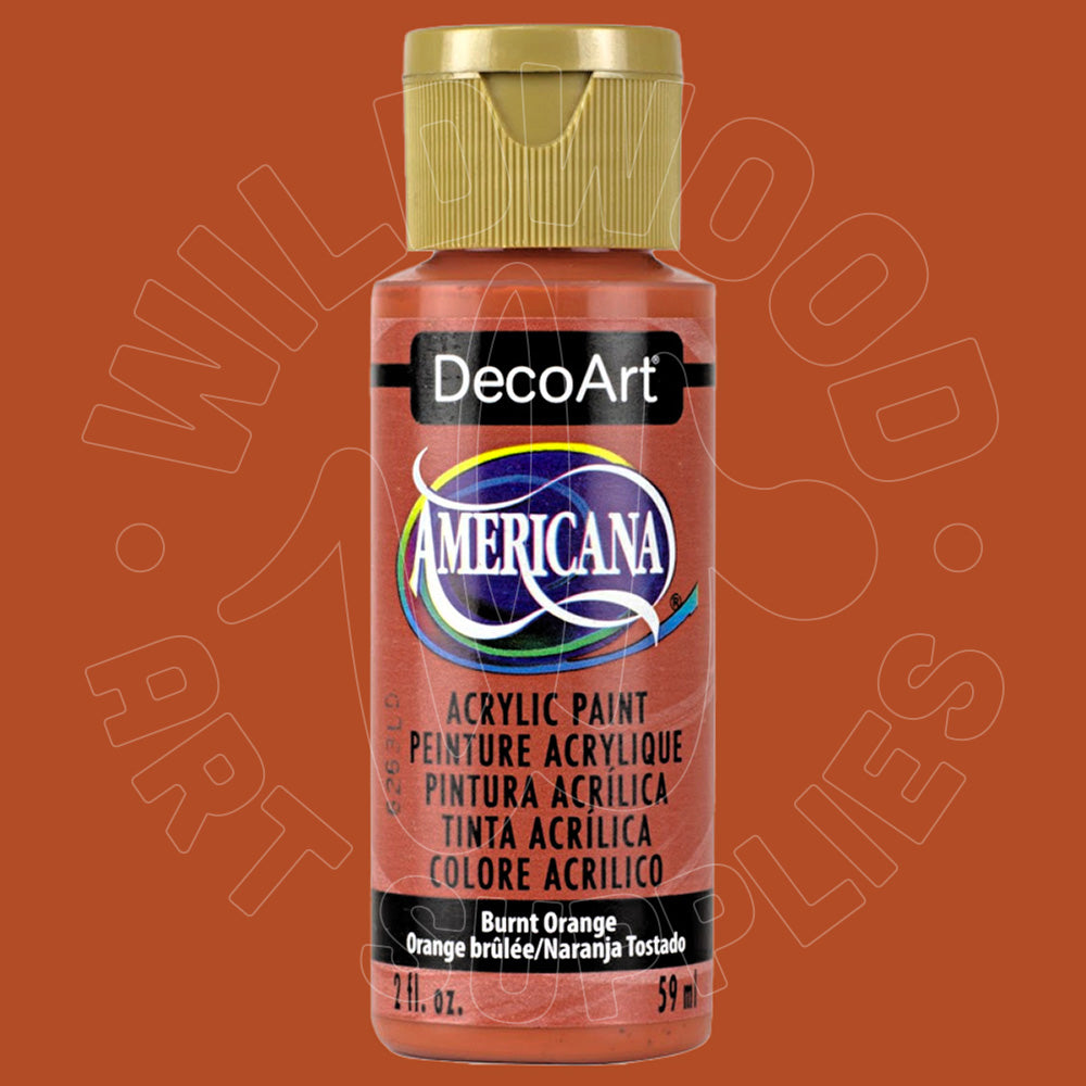 A bottle of DecoArt Americana acrylic paint in the color Burnt Orange, featuring a gold cap and a black label with white text, set against a solid orange-brown background.