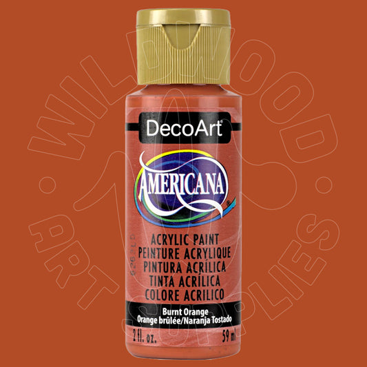 A bottle of DecoArt Americana acrylic paint in the color Burnt Orange, featuring a gold cap and a black label with white text, set against a solid orange-brown background.