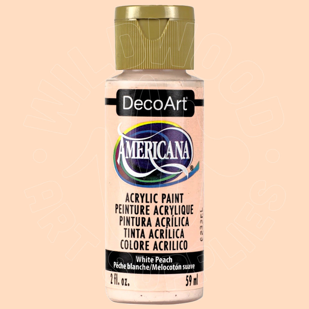 A bottle of DecoArt Americana acrylic paint in the color White Peach, featuring a gold cap and a white label with black text, set against a solid pale peach background.