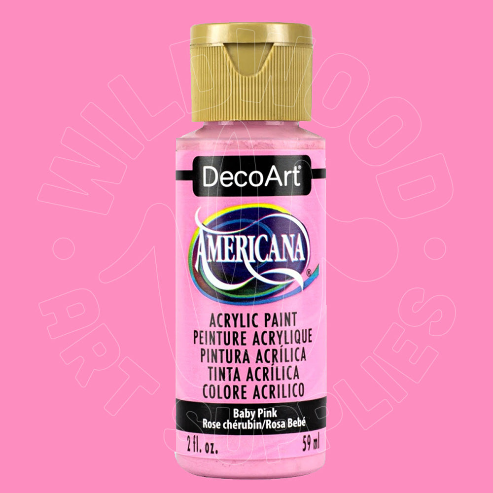 A bottle of DecoArt Americana Baby Pink acrylic paint with a gold cap, set against a solid pink background with a faint watermark.