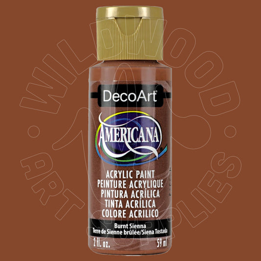 A bottle of DecoArt Americana acrylic paint in the color Burnt Sienna, featuring a brown body, a gold cap, and a black label with white and blue branding.