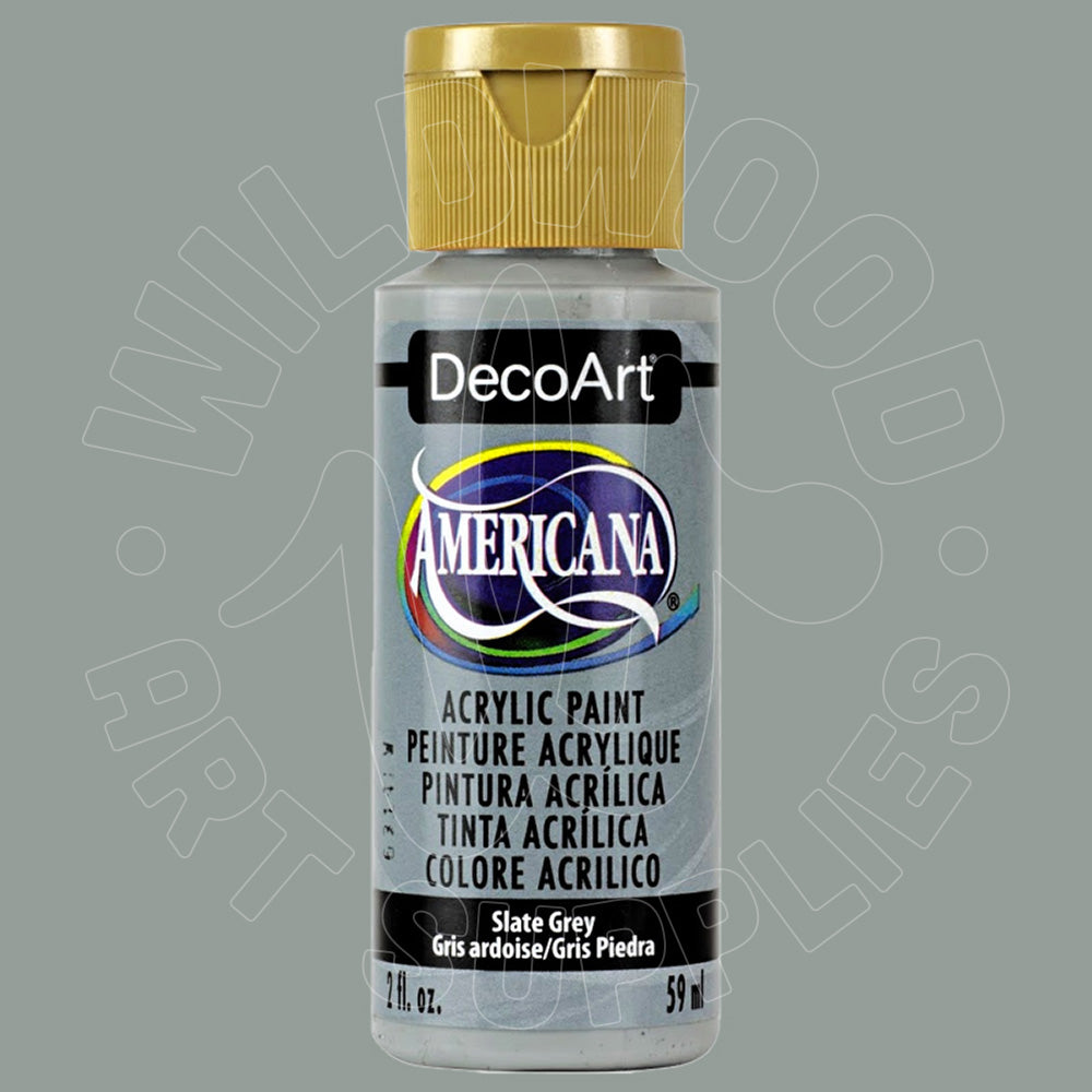 A bottle of DecoArt Americana acrylic paint in the color Slate Grey, featuring a gold cap and a silver-grey bottle, shown against a solid grey background.