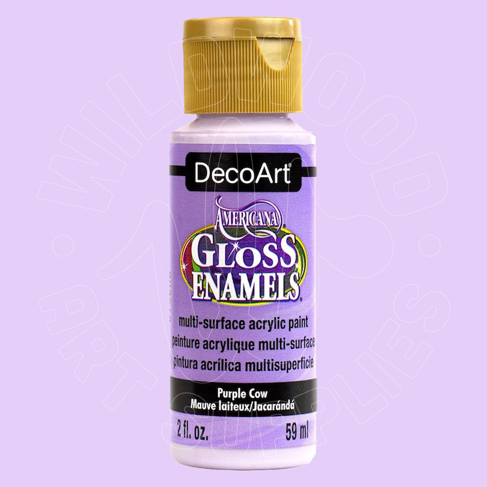 A bottle of DecoArt Americana Gloss Enamel paint in 'Purple Cow' with a gold cap, shown against a light purple background.