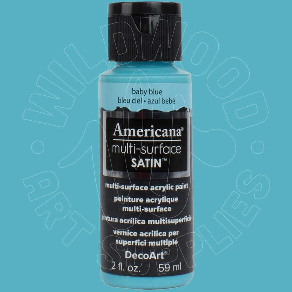 A bottle of Americana Multi-Surface Satin acrylic paint in 'baby blue' by DecoArt, featuring a black cap and black label with white text, set against a solid turquoise-blue background with a faint watermark.