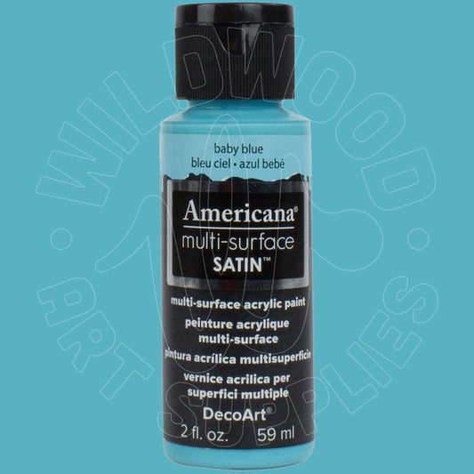 A bottle of Americana Multi-Surface Satin acrylic paint in 'baby blue' by DecoArt, featuring a black cap and black label with white text, set against a solid turquoise-blue background with a faint watermark.