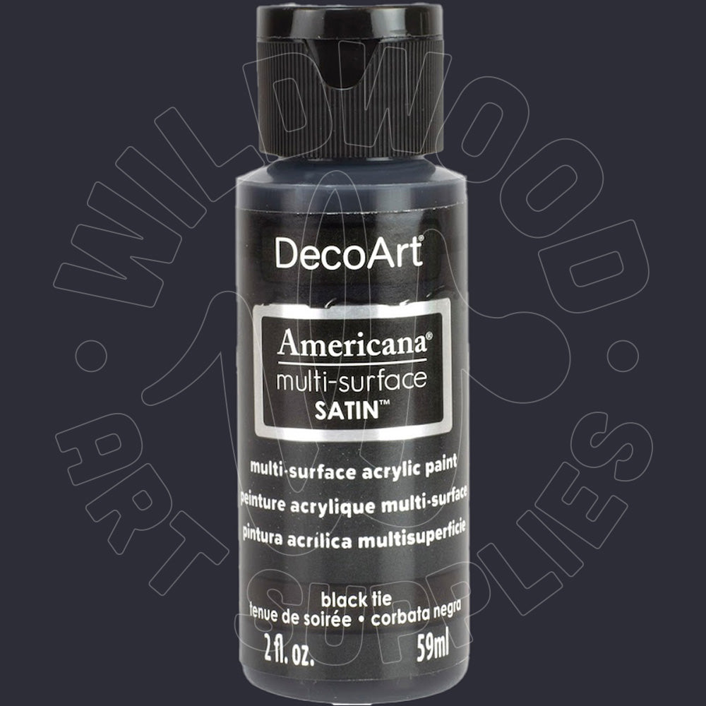 A bottle of DecoArt Americana multi-surface SATIN acrylic paint in the color black tie, shown against a dark gray background with a faint watermark.