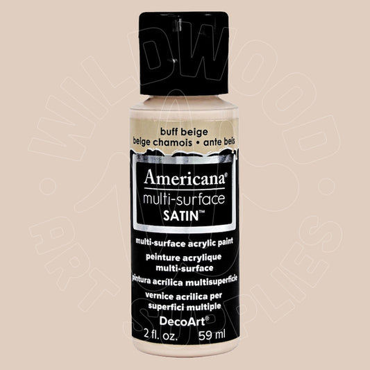 A bottle of DecoArt Americana multi-surface acrylic paint in the shade buff beige, featuring a black cap and a black label with white text.