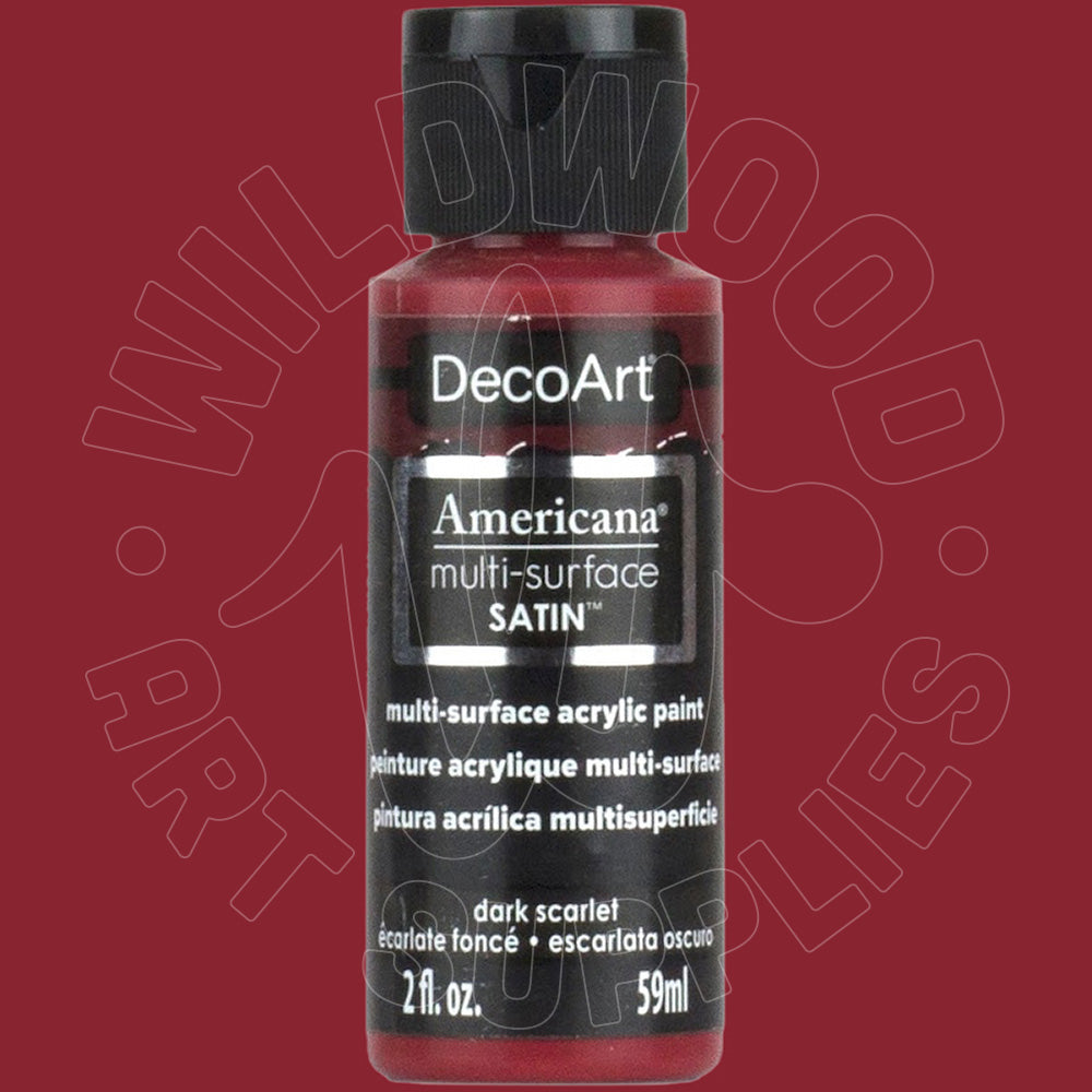 A bottle of DecoArt Americana multi-surface SATIN acrylic paint in the color 'dark scarlet'. The paint inside is visible through the clear bottle as a deep red shade.