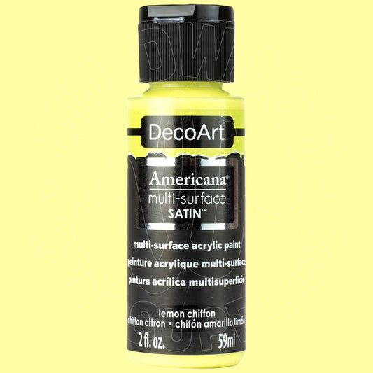 A bottle of DecoArt Americana multi-surface satin acrylic paint in lemon chiffon, featuring a bright yellow body and a black cap and label, set against a solid pale yellow background.