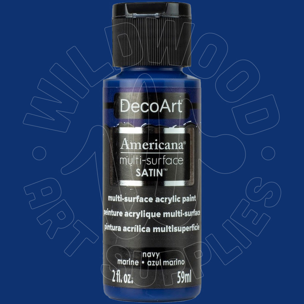 A bottle of DecoArt Americana multi-surface satin acrylic paint in navy blue, shown against a solid dark blue background with a faint watermark.