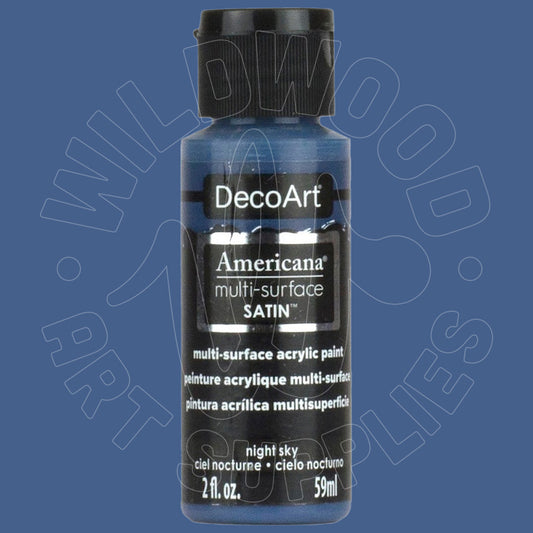 A bottle of DecoArt Americana multi-surface satin acrylic paint in the color 'night sky', shown against a solid blue background with a faint watermark.