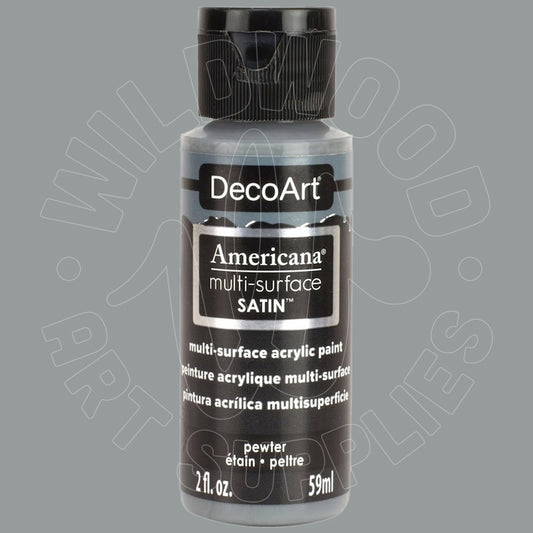 A bottle of DecoArt Americana multi-surface SATIN acrylic paint in the color pewter, shown against a solid gray background with a faint watermark.