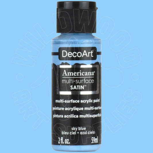 A bottle of DecoArt Americana multi-surface SATIN acrylic paint in the color 'sky blue', shown against a solid light blue background with a faint watermark.
