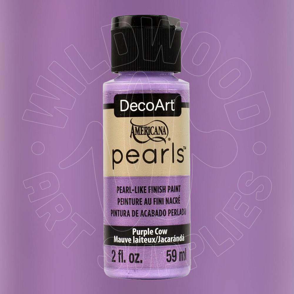 A bottle of DecoArt Americana Pearls acrylic paint in the color 'Purple Cow' (mauve laiteux/jacarandé), featuring a black cap and a beige label with purple text, set against a solid purple background.