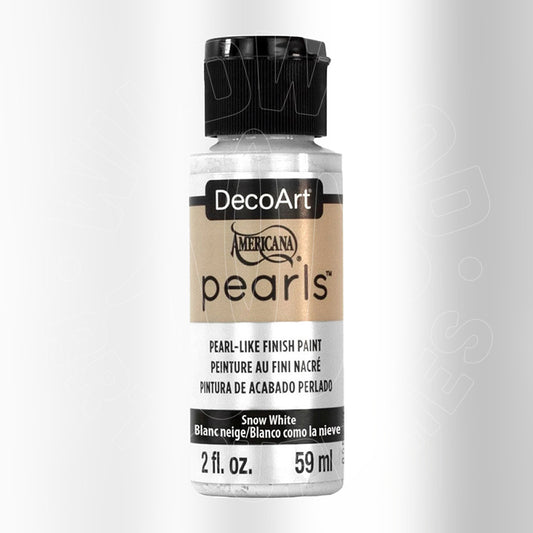 A bottle of DecoArt Americana Pearls acrylic paint in the color Snow White, with a black cap and a beige and white label.